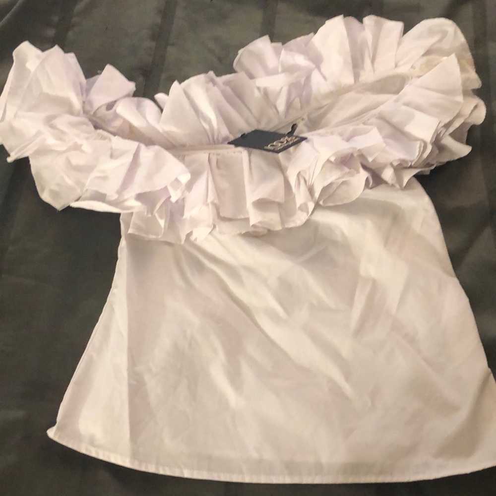 White pleated blouse.